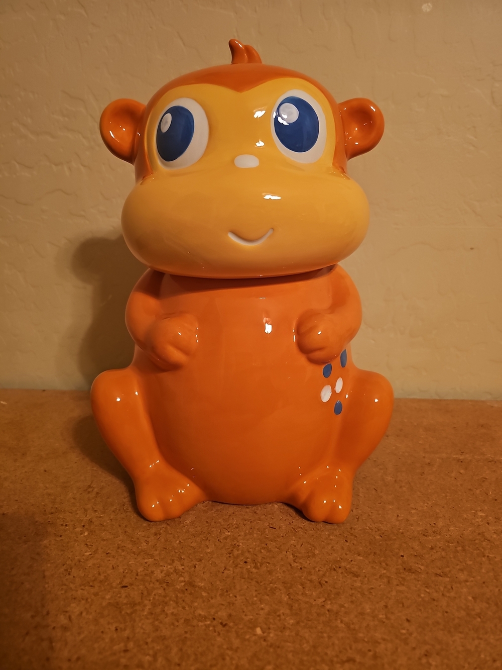 Target Orange and Cream Monkey Coin Bank with Blue Eye Accents